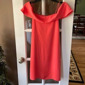 Off the shoulder dress in the color salmon by Naked Zebra